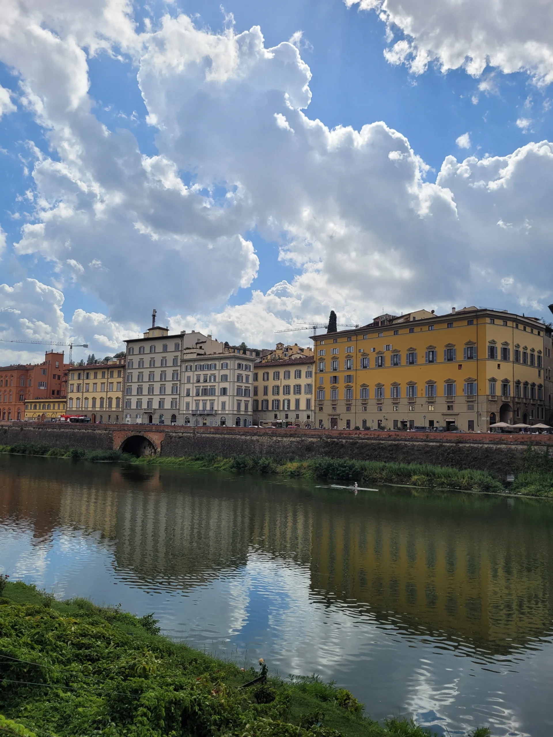 Arno river and historic buildings in Florence Italy