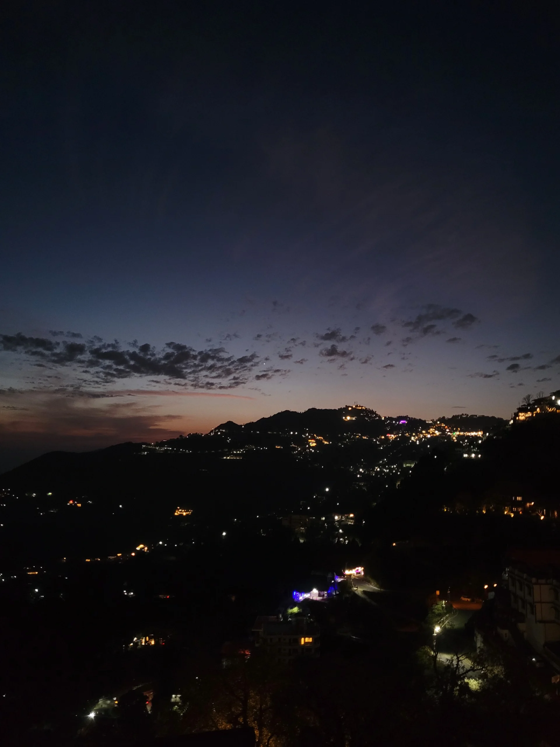 Mussoorie hillside lit up at night